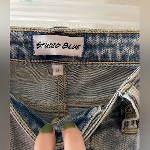 Studio Blue ripped ankle jeans.